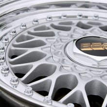 Load image into Gallery viewer, Close-up of BBS RS001 wheel with high polished lip and metallic silver face, featuring distinctive black and gold BBS logo.