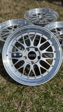 Load image into Gallery viewer, Diamond silver BBS LM 276 wheel with 5x120 bolt pattern, compatible with BMW models, shown on grass