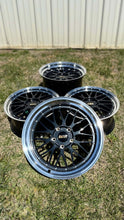 Load image into Gallery viewer, 19" BBS LM rims in black and blue for Porsche 997, showcasing a metallic black finish with diamond cut rim on grass.