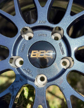 Load image into Gallery viewer, Close-up of 19-inch BBS LM wheel in metallic black and blue finish, suited for Porsche 997 widebody, featuring BBS logo.