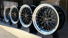 Load image into Gallery viewer, 19-inch BBS LM wheels in metallic black and blue for Porsche 997, featuring diamond cut rims and 2-piece aluminum design.