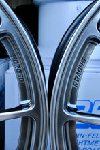 Load image into Gallery viewer, Close-up of 18-inch BBS RI-A forged monoblock wheels with concave design and diamond black finish, perfect for BMW M3 fitments.