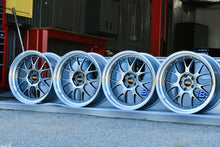 Load image into Gallery viewer, Set of 4 BBS LM-R wheels with diamond black disk and silver diamond-cut rim, designed for F8X M fitment, displayed in a workshop.