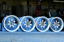 Load image into Gallery viewer, Set of four 20-inch BBS LM-R wheels with diamond black and silver finish, perfect for F8X M fitment, displayed on warehouse floor.