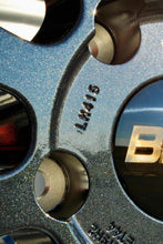 Load image into Gallery viewer, Close-up of BBS LM415 wheel in metallic black and blue finish for Porsche 997, showcasing the detailed craftsmanship.