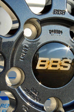 Load image into Gallery viewer, Close-up of 19-inch BBS LM287 wheel with black and blue finish for Porsche 997 widebody, showcasing logo and metallic detail.