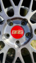 Load image into Gallery viewer, Close-up of a 19" BBS LM227/228 wheel with brushed finish and red center cap, 5x120 bolt pattern, showcasing intricate design.