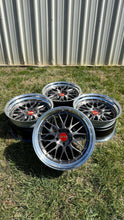Load image into Gallery viewer, Set of 19-inch BBS LM brushed wheels in a 5x120 bolt pattern displayed outdoors.