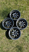 Load image into Gallery viewer, Set of four 18-inch BBS RG-R wheels in diamond black finish, ideal for BMW E30 M3, E36, and more, on grass background.