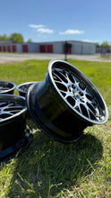 Load image into Gallery viewer, 18-inch BBS RG-R RG737 diamond black wheel for BMW models, displayed on grass outdoor setting.