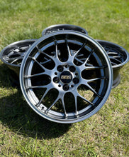 Load image into Gallery viewer, 18 inch BBS RG-R wheel with diamond black finish, suitable for BMW E30, E36, E34, and E24 models, shown on grass.