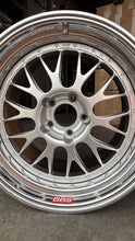 Load image into Gallery viewer, Close-up of an 18-inch BBS E88 race wheel, silver face with race pockets and BBK clearance, ideal fit for E46 M3 and E9X M models.