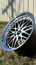 Load image into Gallery viewer, 20-inch BBS LM225 wheel for BMW models, featuring gloss silver powder-coated face, 5x120 PCD, 72.56mm hub size, in a grassy setting