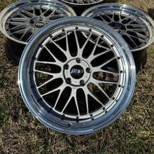 Load image into Gallery viewer, Refinished BBS LM 20-Inch Wheels with Gloss Silver Powder Coat for BMW, Featuring 9.5-Inch Width and ET21 Offset on Grass Background