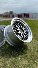 Load image into Gallery viewer, 19-inch BBS LM434/LM435 wheel with diamond black disk and silver rim, designed for F8X M fitment, displayed outdoors on grass