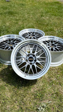 Load image into Gallery viewer, Set of four 19-inch BBS LM wheels for F8X M with diamond black disk and silver rim, 5x120 PCD fitment, shown on grass.