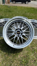 Load image into Gallery viewer, 19" BBS LM434/LM435 wheel set for F8X M with diamond black disk and silver diamond cut rim on grass