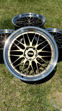 Load image into Gallery viewer, 20/21-inch BBS LM471/474 wheels with 5x130 bolt pattern, two-piece forged design, ideal for Porsche 992, displayed on grass.