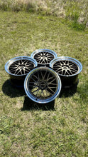Load image into Gallery viewer, Brand new BBS LM471 / 474 wheels for Porsche, 5x130 bolt pattern, two-piece forged design, 20/21 inches, set of four on grass.
