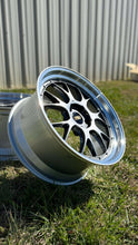 Load image into Gallery viewer, 20" BBS LM-R wheel with diamond black disk and silver diamond-cut rim, designed for F8X M models, on grassy background.