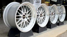 Load image into Gallery viewer, Set of four 19-inch BBS LM wheels with diamond silver mesh design, perfect for E46 M3 and E9X M fitment, on display in garage.