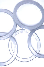 Load image into Gallery viewer, Set of Genuine BBS PFS rings in various sizes for BBS wheels, featuring a 70mm to 82mm center bore, ideal for precision fitting.