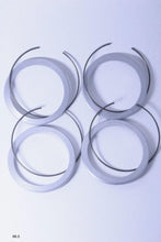 Load image into Gallery viewer, Set of four Genuine BBS PFS rings in multiple sizes on a white background for compatible BBS wheels.
