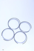 Load image into Gallery viewer, Set of four Genuine BBS PFS rings for BBS wheels, featuring 82mm outer diameter, ideal for 5x100 and 5x112 wheel setups.