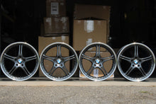 Load image into Gallery viewer, 19-inch SSR GT3 wheels with BMW center caps, powder-coated dark metallic grey faces, polished outers, and satin black inners.