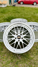 Load image into Gallery viewer, 19&quot; BBS LM272 mesh wheels in diamond silver finish, ideal for E46 M3 and E9X M, shown on grass with original boxes.
