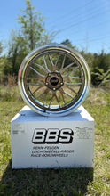 Load image into Gallery viewer, 20/21 inch BBS LM471 forged wheel on box in outdoor setting, ideal for Porsche with 5x130 bolt pattern.

