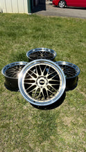 Load image into Gallery viewer, Set of four 20/21&quot; BBS LM471 / 474 wheels with 5x130 bolt pattern, ideal for Porsche 992, displayed on grass
