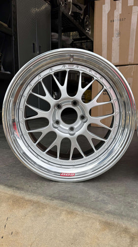 18-inch BBS E88 racing wheel with silver finish and race pockets, designed for E46 M3 and E9X M models, in stock and ready to ship.