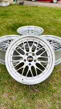 Load image into Gallery viewer, BBS LM272 mesh design 19-inch wheels in silver, perfect for BMW E46 M3 and E9X models, shown on grass.
