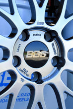 Load image into Gallery viewer, Close-up of a BBS LM434 wheel for F8X M fitment, featuring diamond black disk and silver diamond cut rim, 5x120 bolt pattern.
