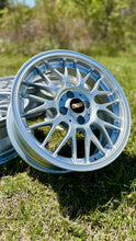 Load image into Gallery viewer, BBS RG-F 16-inch wheel in brilliant silver, lightweight die forged aluminum, perfect fit for E30 BMWs, with black and gold logo center cap.
