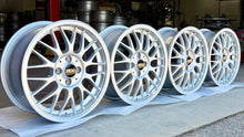 Load image into Gallery viewer, BBS RG-F 16-inch wheels in brilliant silver, ideal for E30 BMWs, featuring 4x100 bolt pattern with die-forged aluminum construction.
