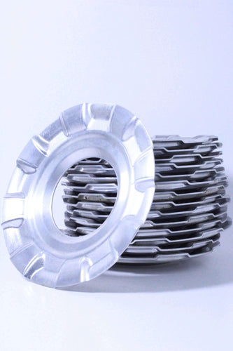 Stack of BBS RSII billet waffle plates for wheel upgrade, featuring corrosion resistance and durability, large thread size 72mm.